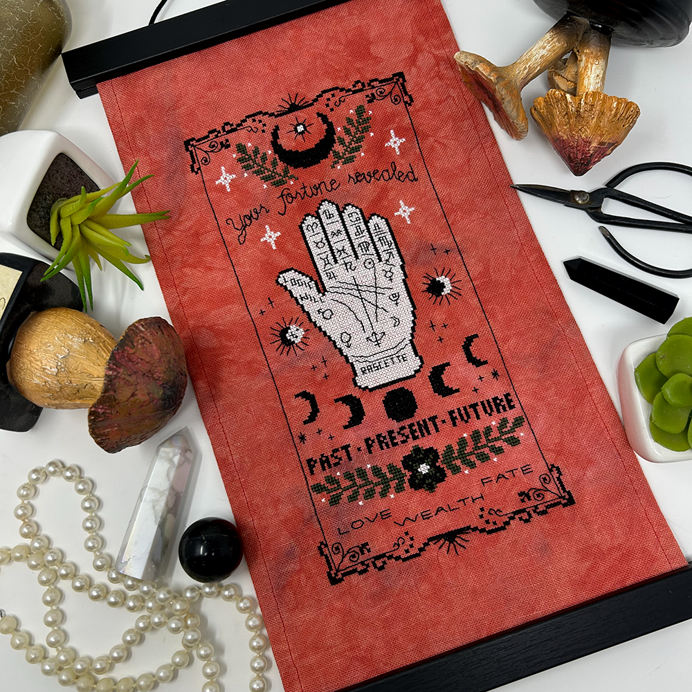 La déesse de Noël - Grille de point de croix PDF