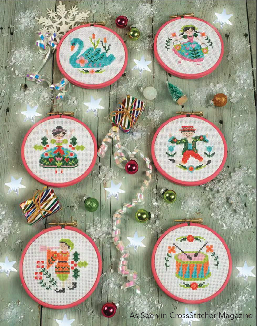 Six hoops with people, drum and swan