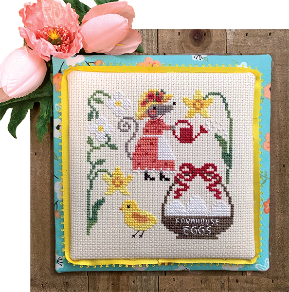 Mouse watering plants with chicken and eggs