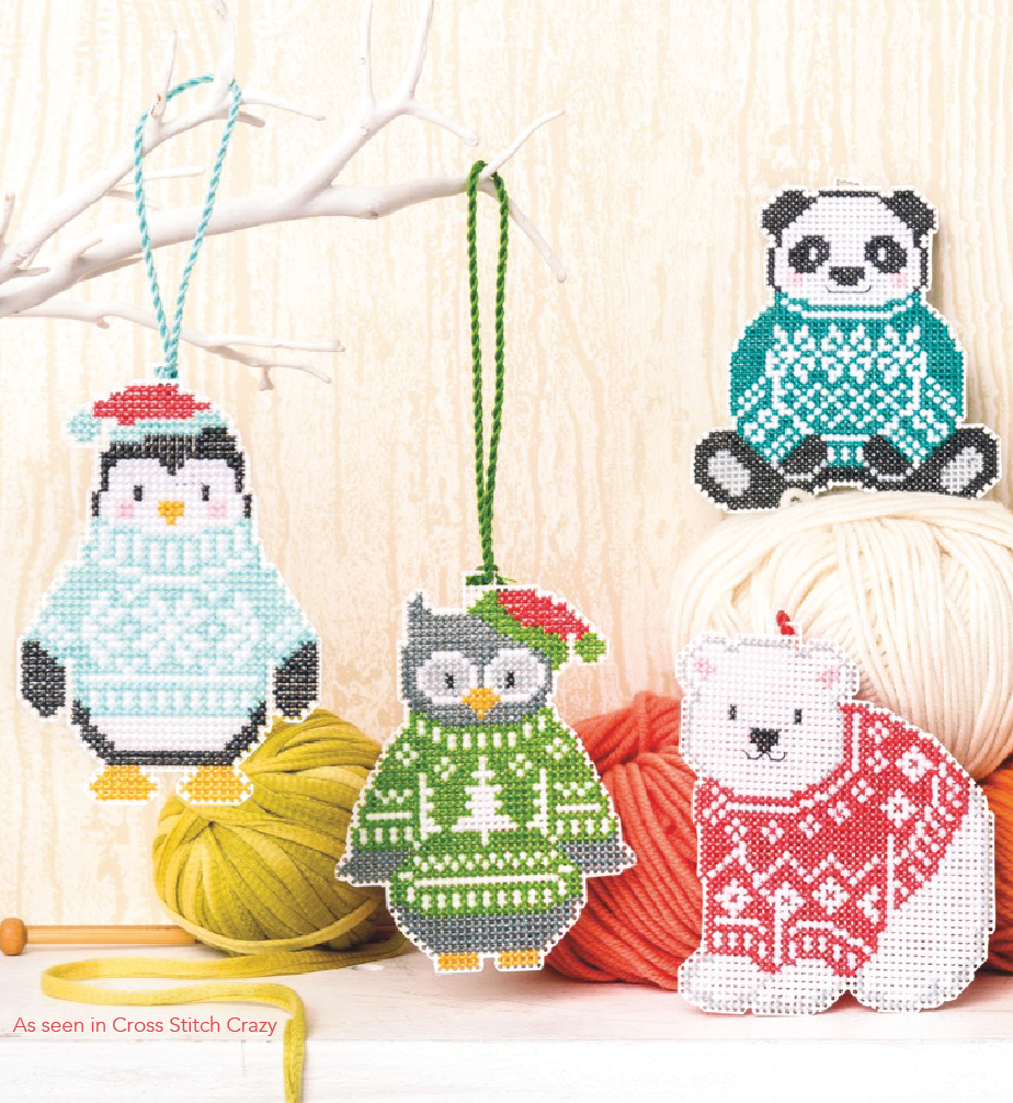 Penguin owl panda and polar bear in sweaters