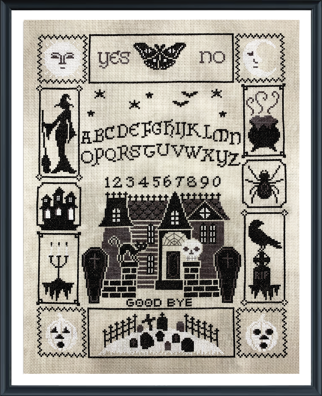 Black and white haunted house with Halloween motifs