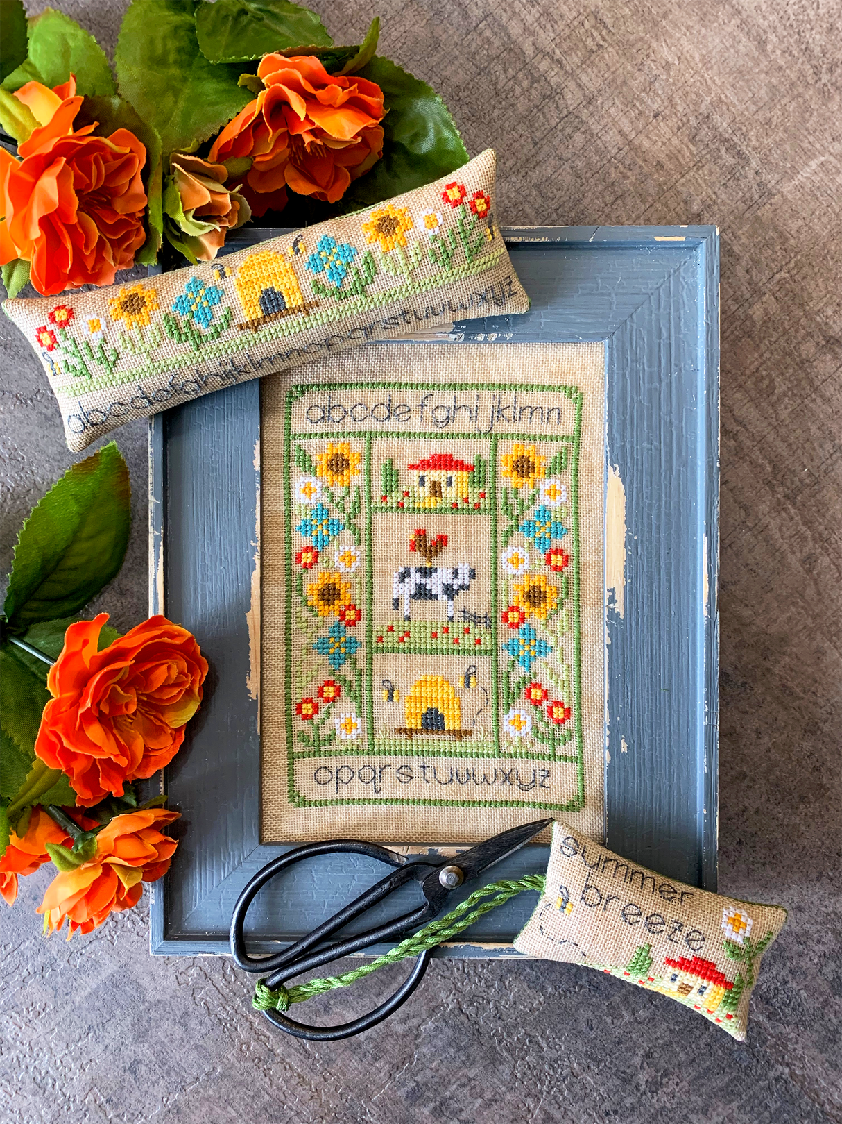 Autumn cow flowers house and bee hive