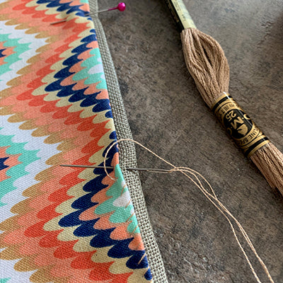 Back being stitched with needle