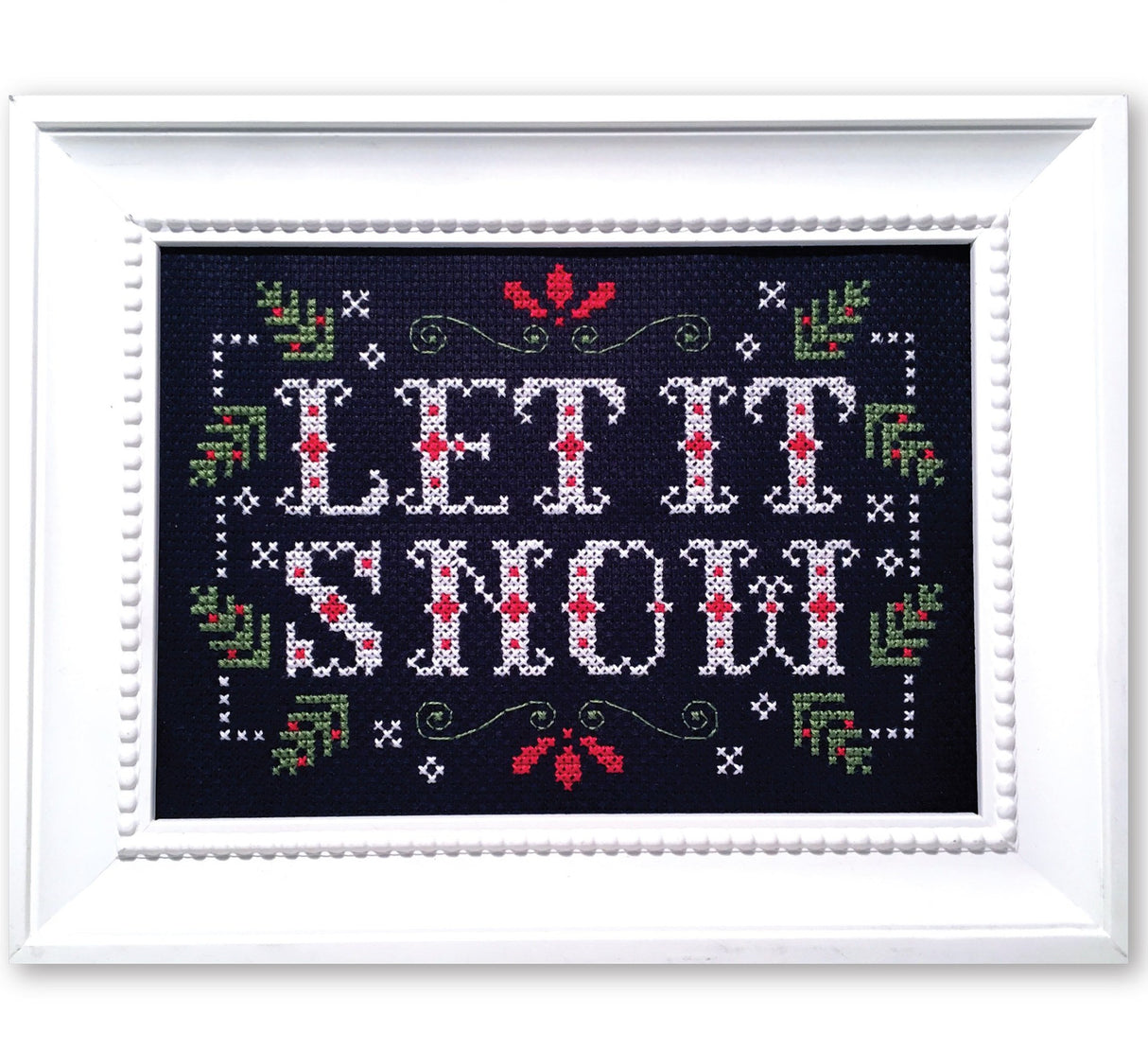 Christmas greenery with text let it snow