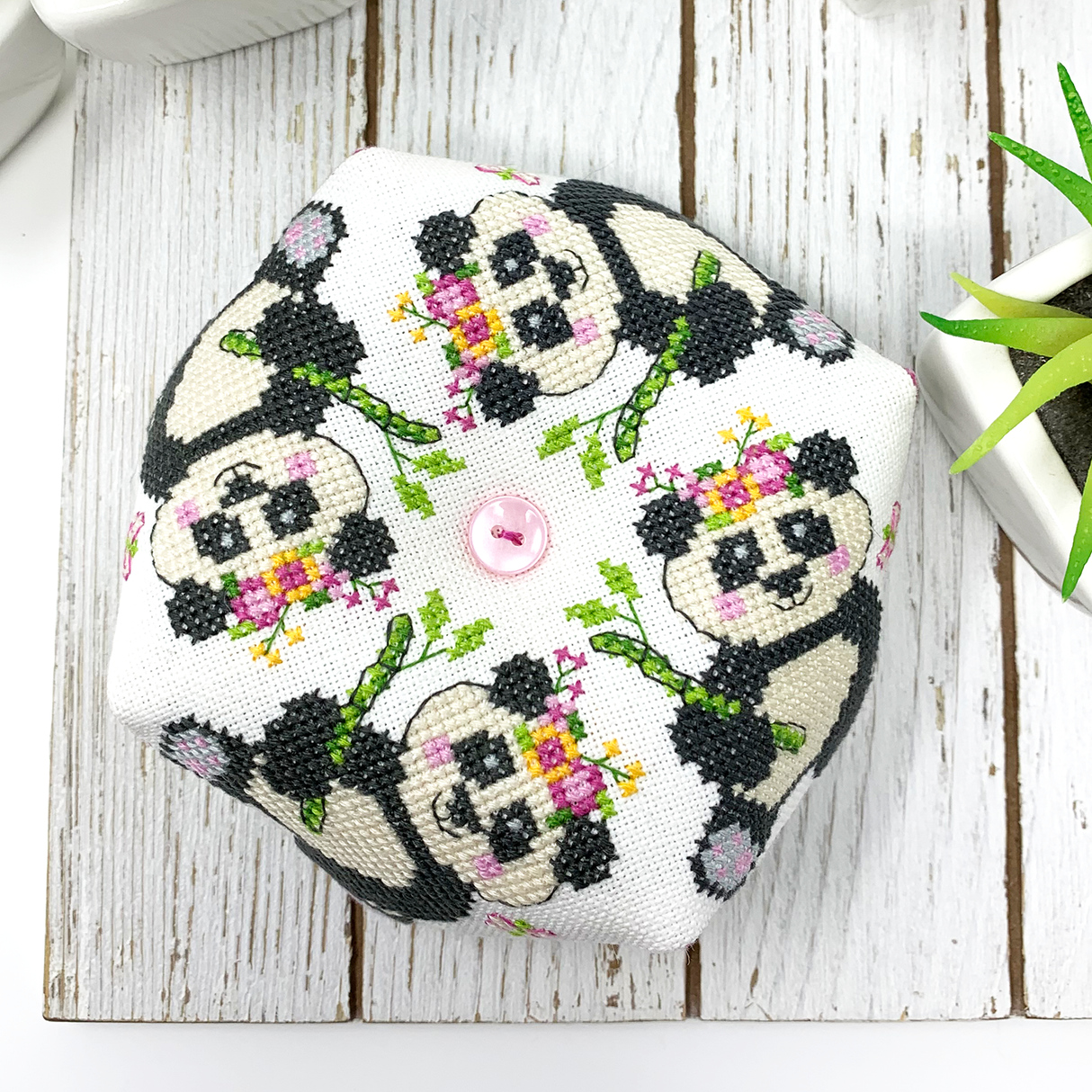 Panda with bamboo and flowers