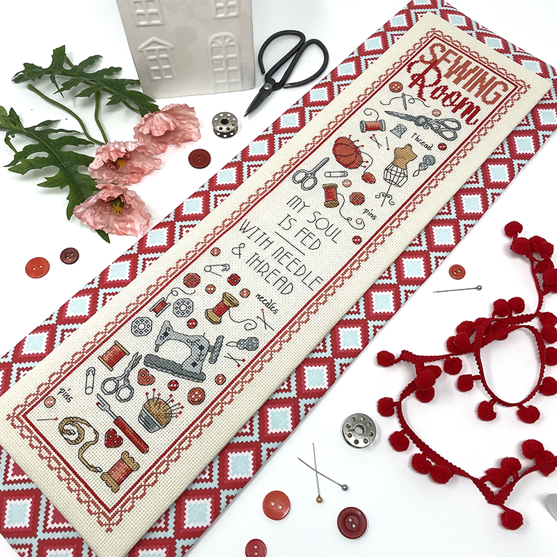 Red sewing motifs with words