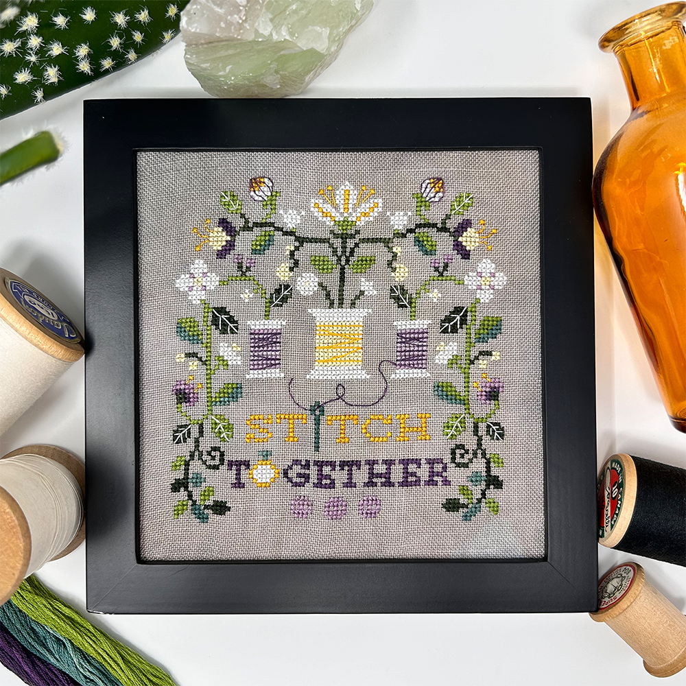 Vines and thread with words “stitch together” 
