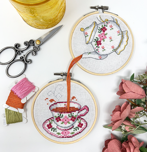 Two hoops with teapot pouring into teacup