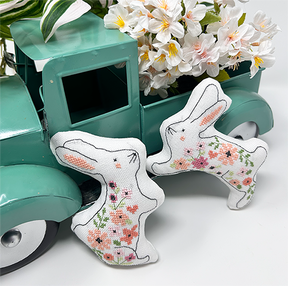 Rabbit pillows with flowers