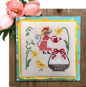 Mouse watering plants with chicken and eggs