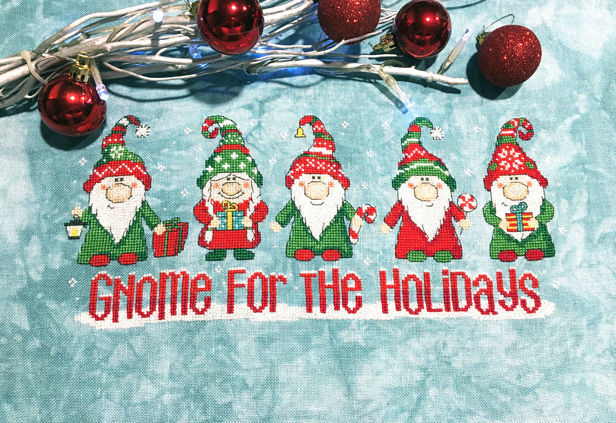 Five Christmas gnomes with words gnome for the holidays