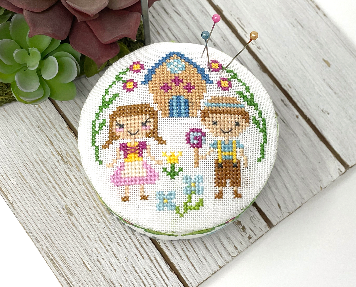 Two children and ginger bread house
