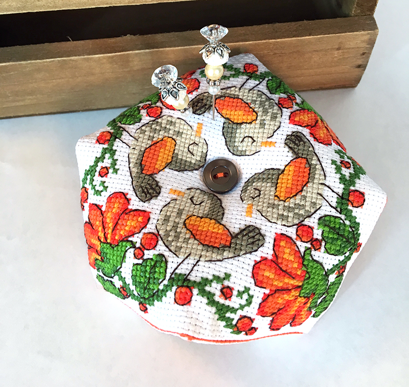 Bird on orange flower