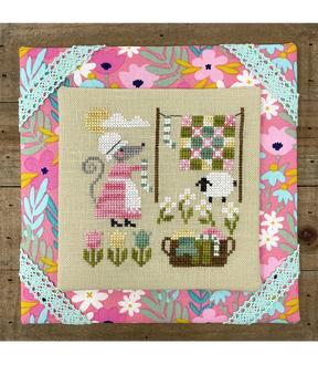 mouse hanging laundry in spring