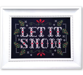 Christmas greenery with text let it snow