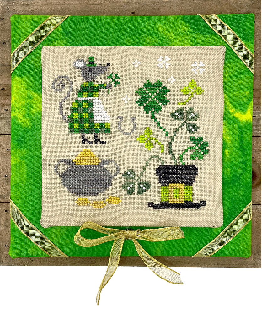 Mouse with four leaf clover and top hat