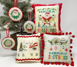 Santa with banner sloth with ornaments and llama with presents and scarves