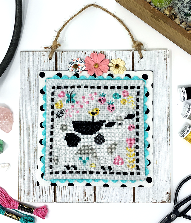 Cow with flowers and strawberries