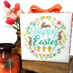 Bunnies with flowers and words happy easter