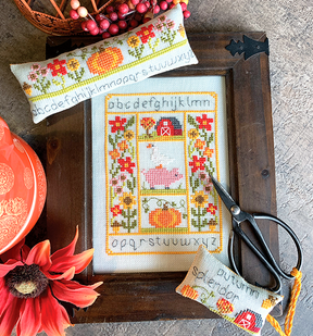 Autumn farm with big and pumpkin and barn