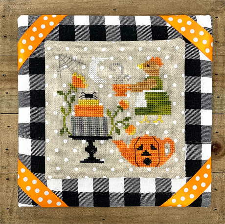 Chicken in dress with tea and Halloween cake