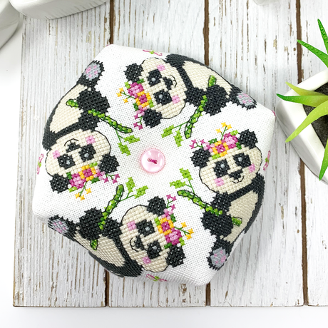 Panda with bamboo and flowers