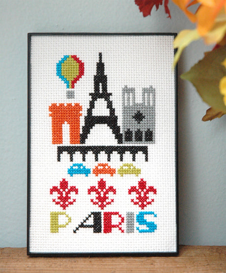 Skyline of the city of Paris with the word Paris at the bottom