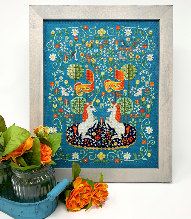 Unicorns with trees and flowers and animals