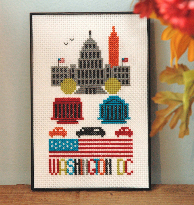 City skyline of Washington DC with the words washington DC at the bottom